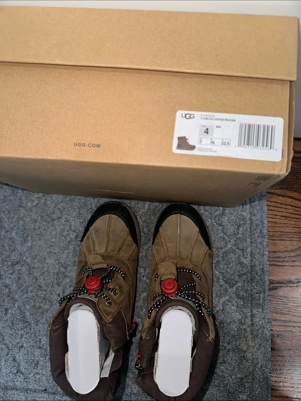 UGG Kids Brown and Black Winter Boots with Red Toggle